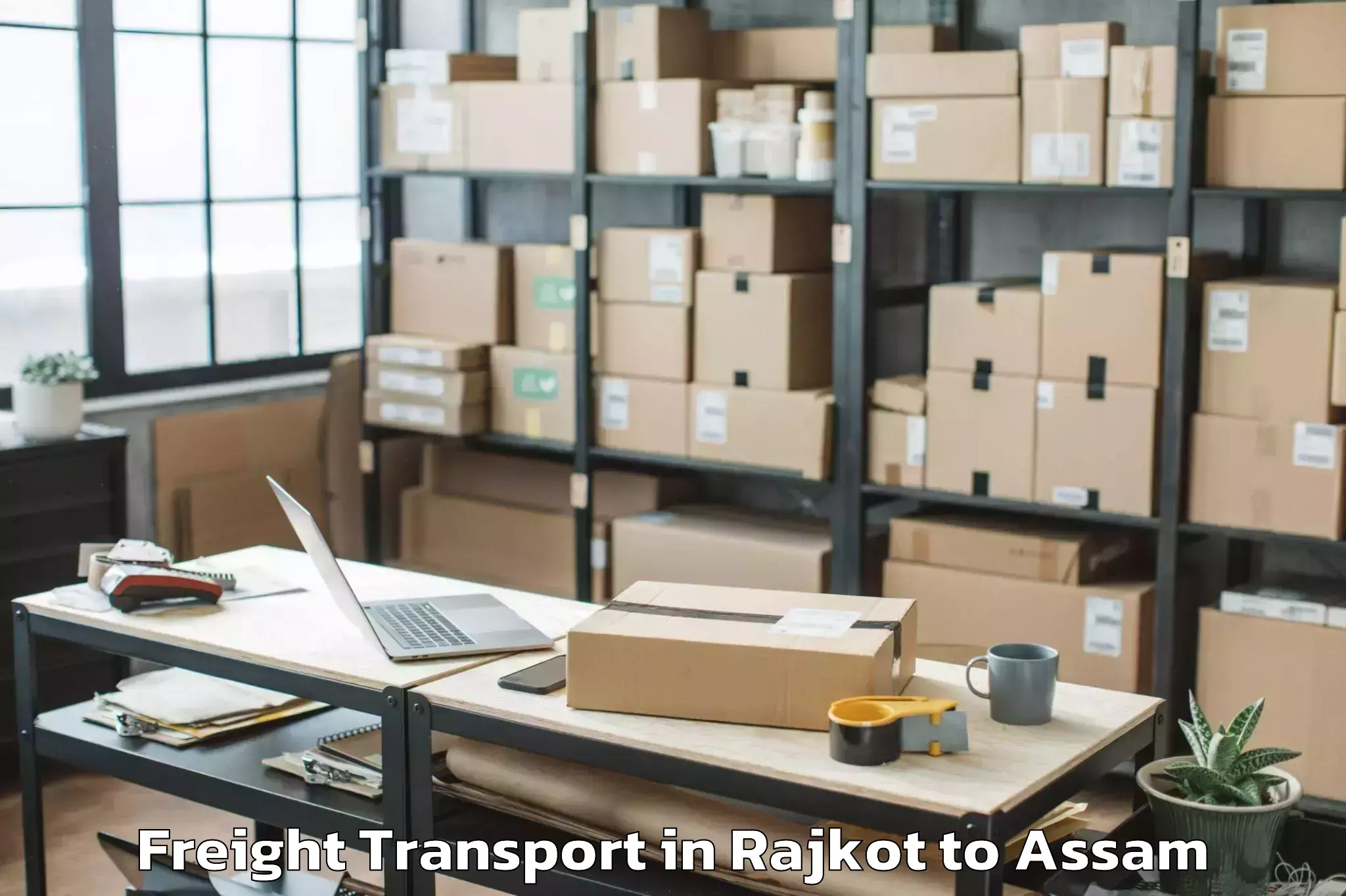 Easy Rajkot to Bokajan Freight Transport Booking